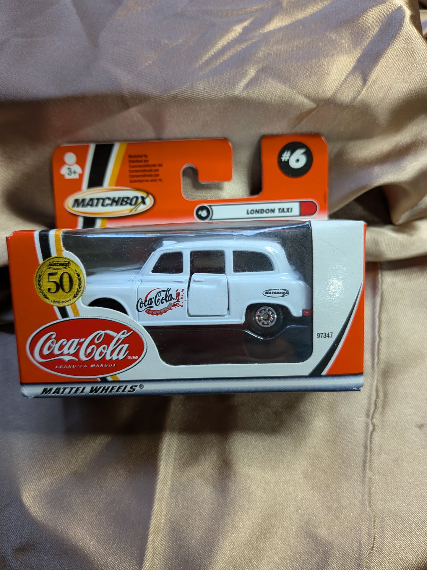 Matchbox 50th Anniversary - London Taxi Coca Cola