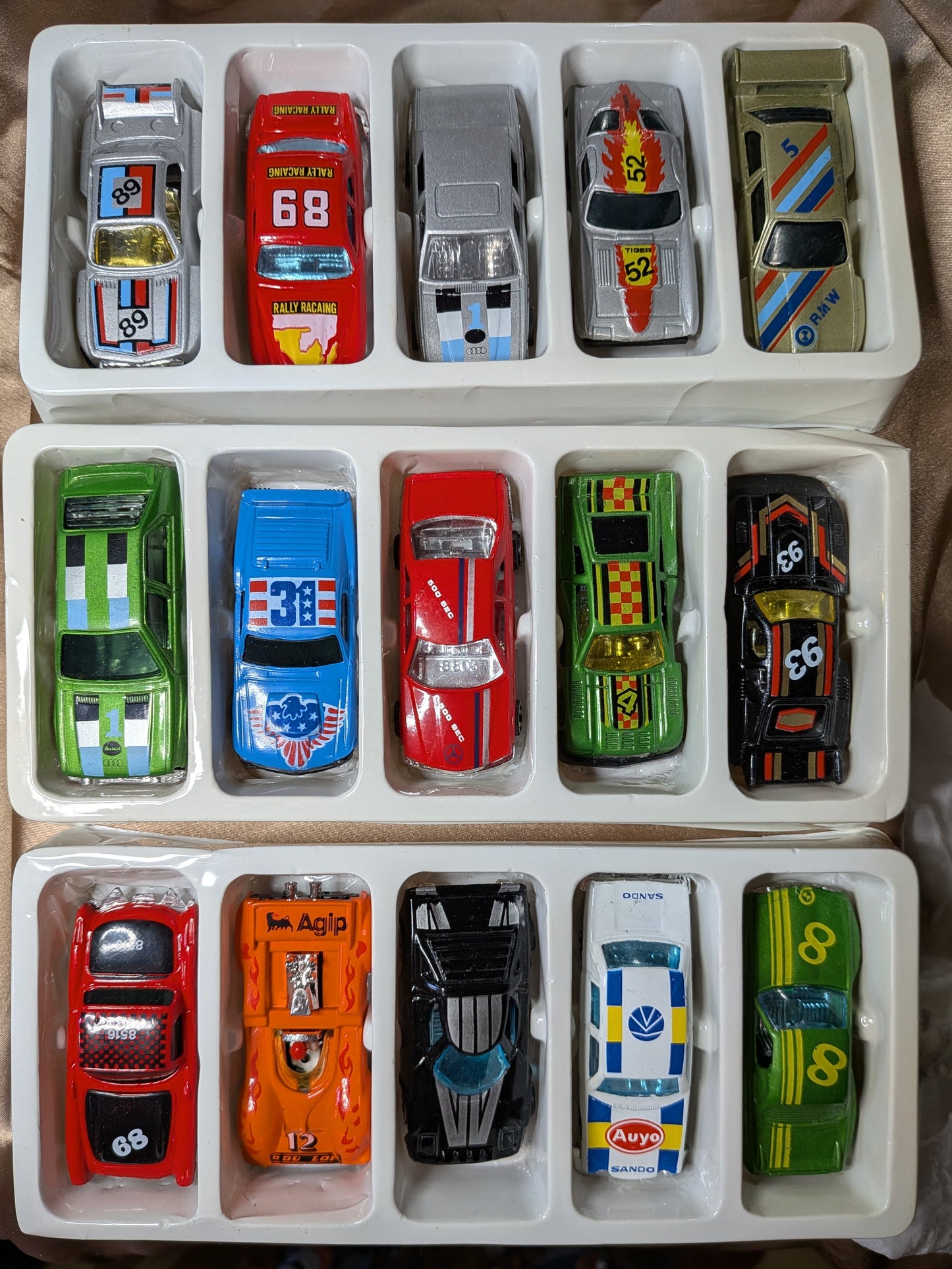 Amazing set of 15 unbranded race cars mint condition.
